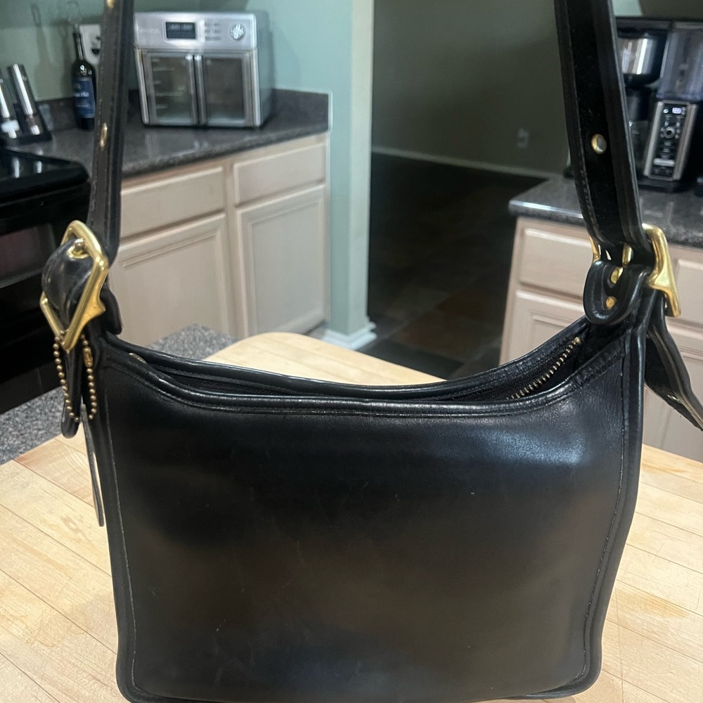 Black Leather Shoulder Bag with Gold Accents